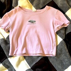 Purple crop top worn a little bit